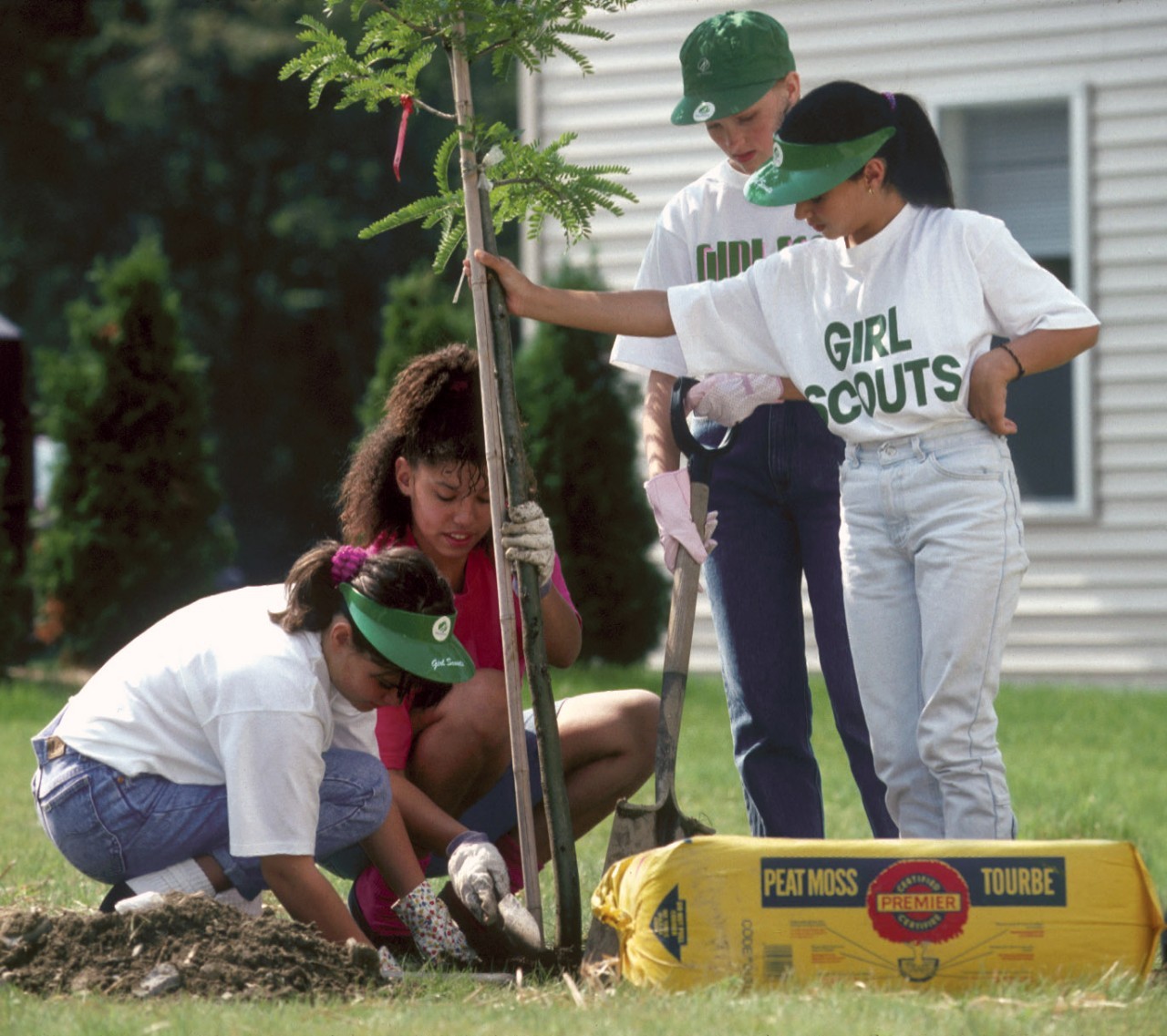 Girl Scouts plant a tree, circa 1990s