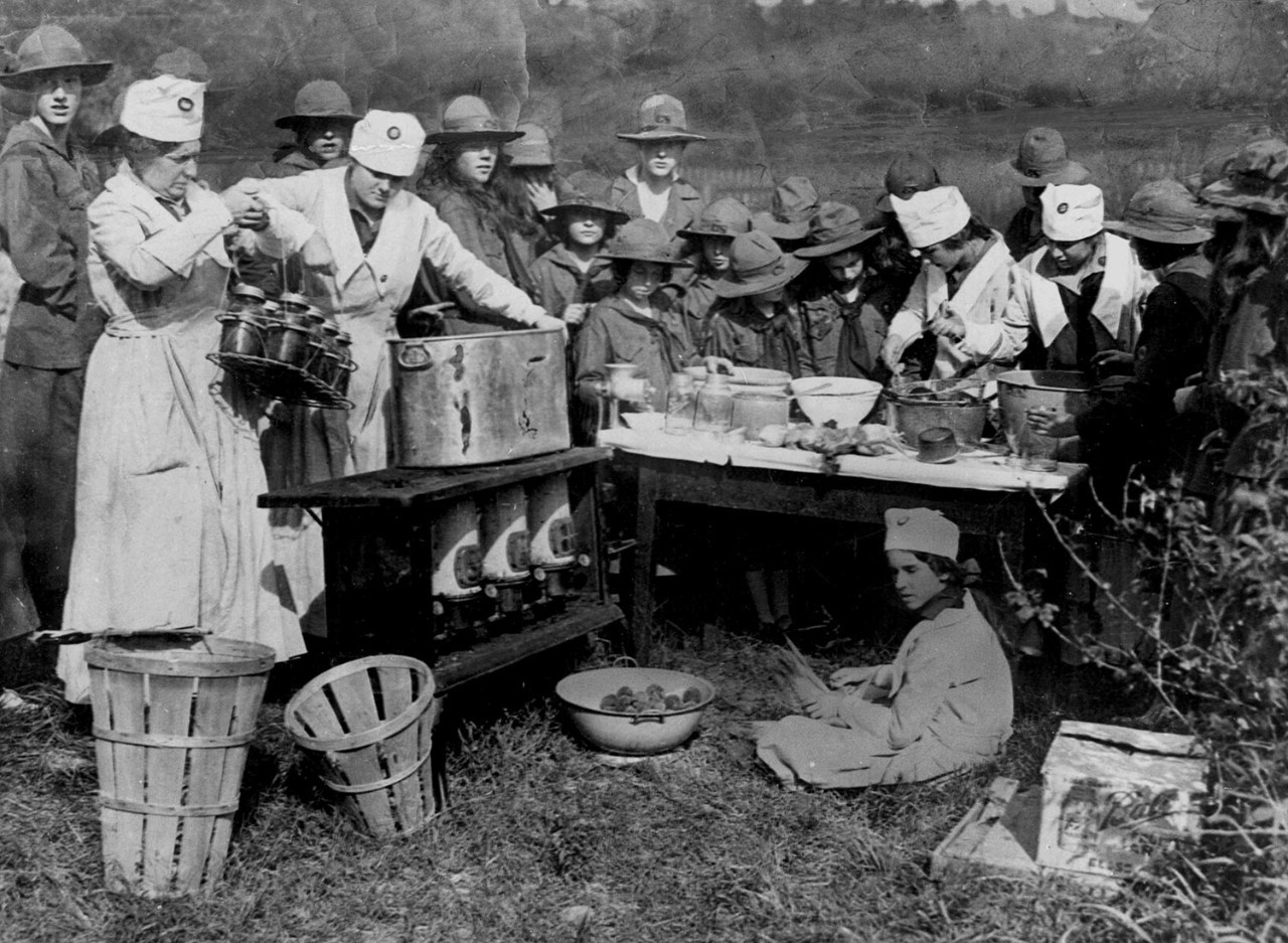 Girl Scouts preserve fruits and vegetables in response to food shortages, circa 1917