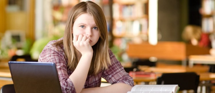 Girl demonstrating signs of being bullied