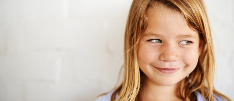 image of a little girl looking like she told a lie