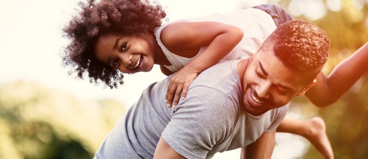 Dad and daughter playing together