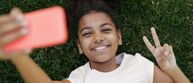 Young girl takes selfie without thinking of her digital privacy