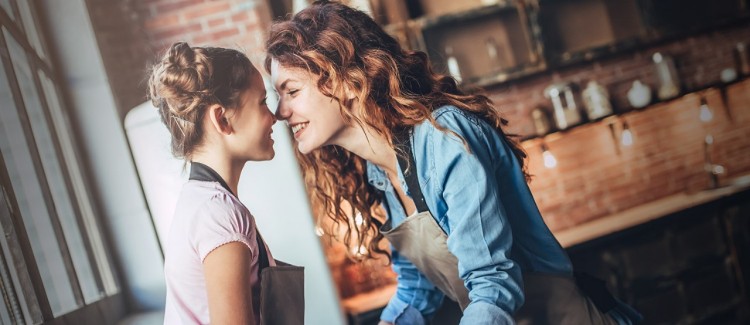 girl and her aunt bonding during Thanksgiving holiday with the family